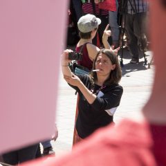 Journalist Erica Meltzer snaps a photo on assignment.