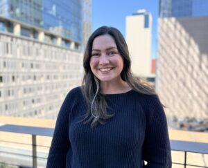 Melanie headshot on rooftop